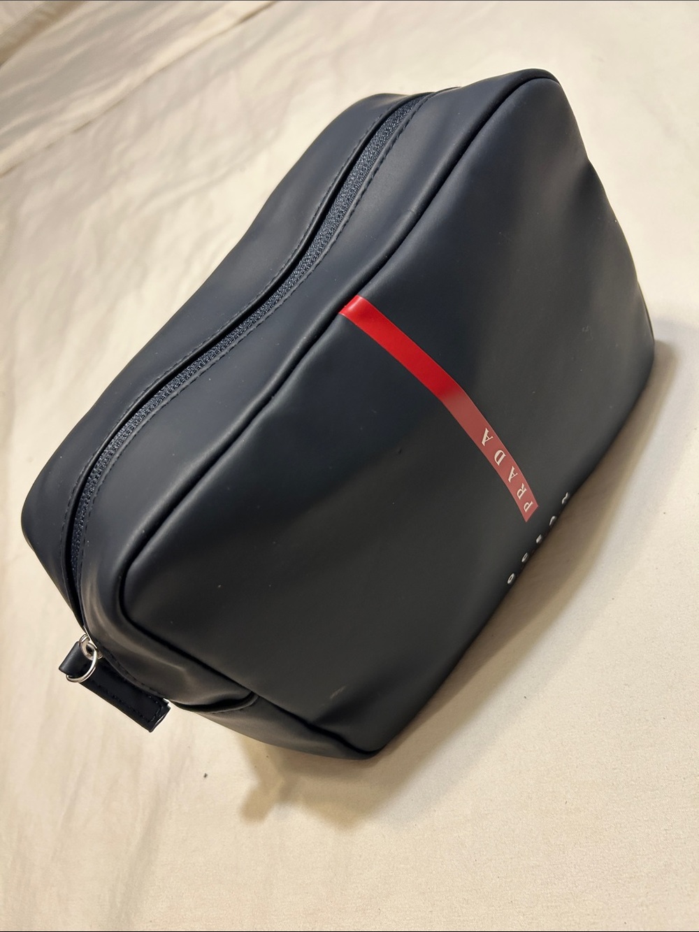 Prada Men’s Black Leather Toiletry Bag with Red Stripe